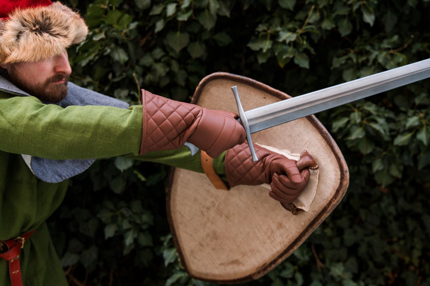 Padded fencing gloves