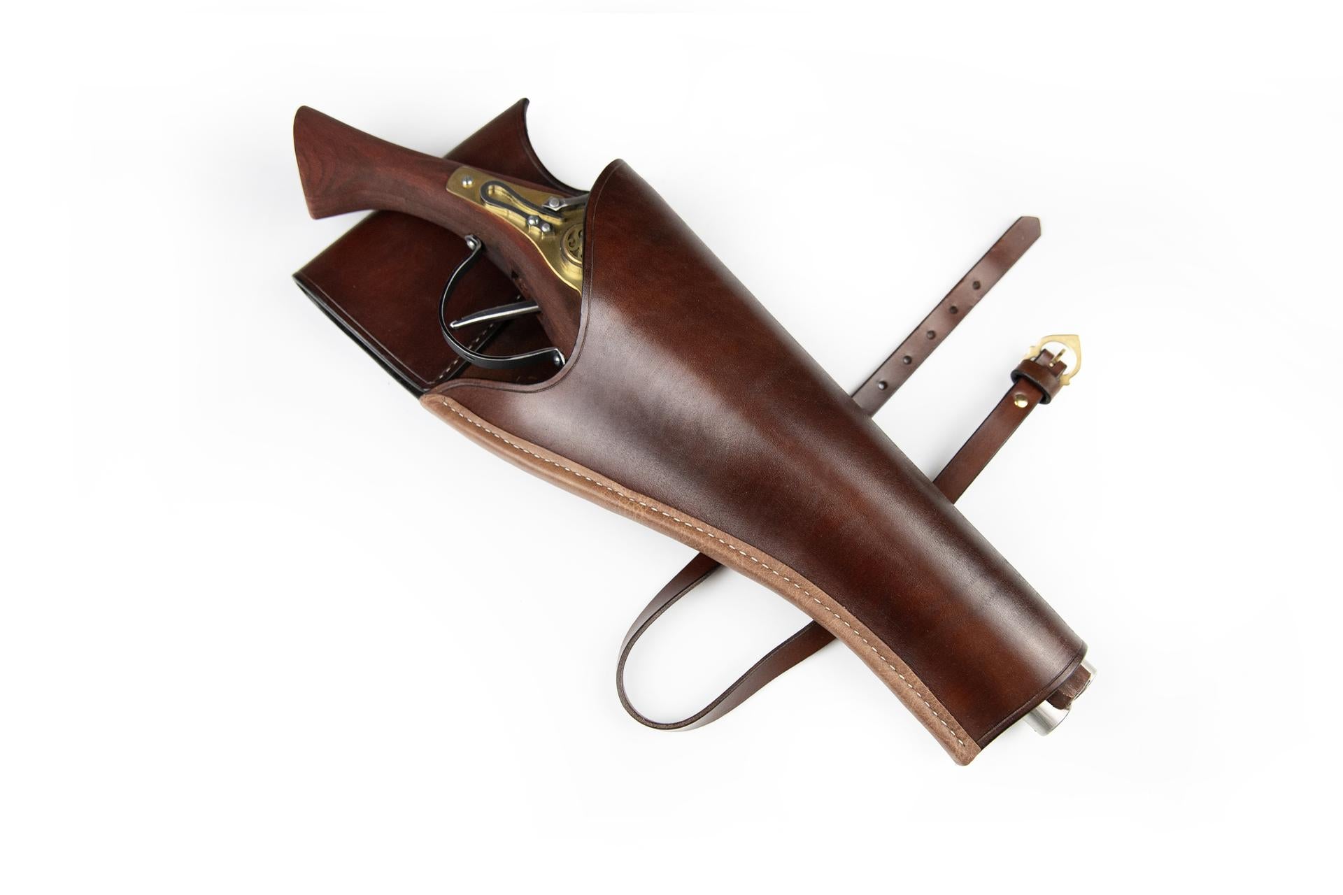 brown leather over-under holster with pistol and belt angled view