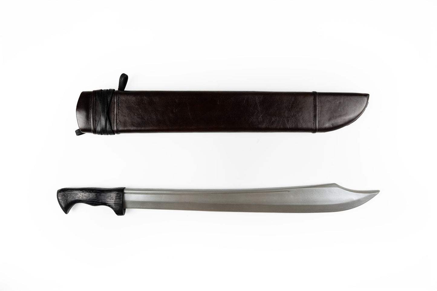Brown leather falchion knife sheath beside the curved falchion blade it is made for
